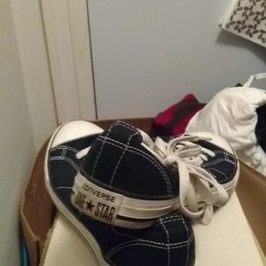 Low tide Converse sneakers